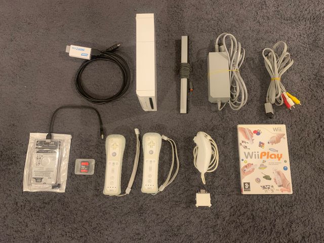 Wii, mandos y +100 juegos.