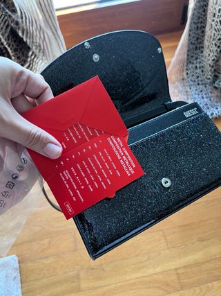 Portafoglio Diesel con tracolla nero