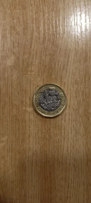 Moneda 1 Libra 12 Cantos