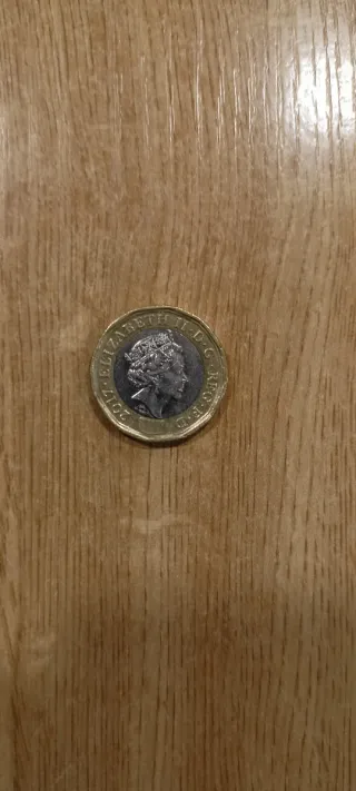 Moneda 1 Libra 12 Cantos