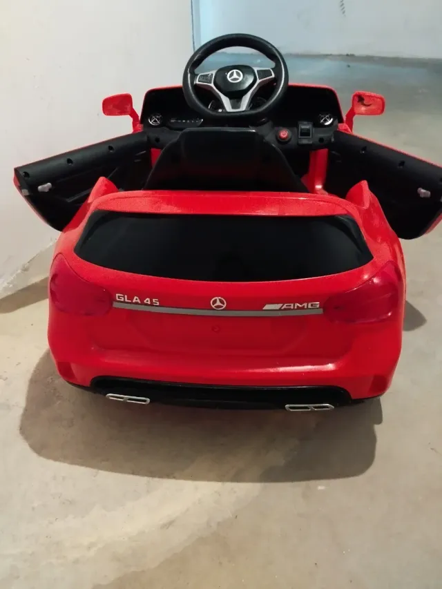 Coche eléctrico infantil rojo