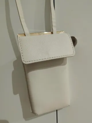 Bolso/Potamóvil Zara blanco y dorado