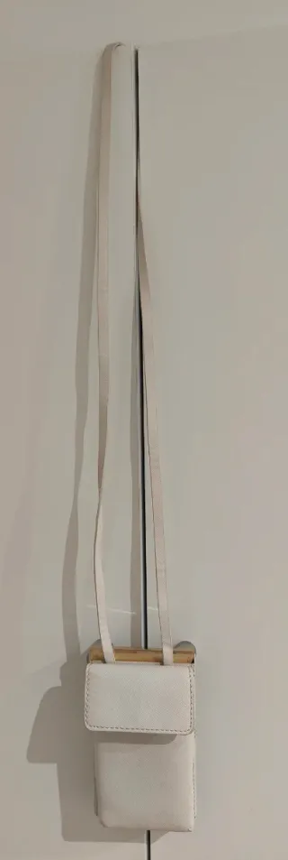 Bolso/Potamóvil Zara blanco y dorado