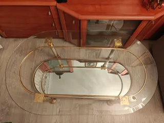 Mesa de centro de cristal y metal dorado