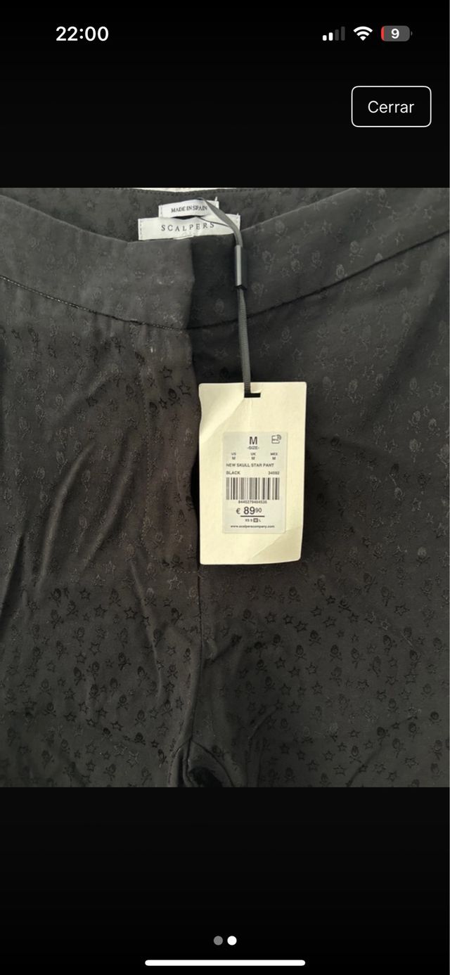 Top negro Scalpers con nudo