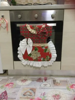 Copri forno a forma di vestitino