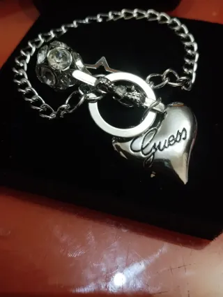 Pulsera Guess Corazón y Estrella Plata