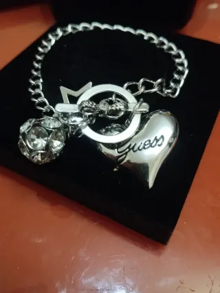Pulsera Guess Corazón y Estrella Plata