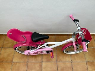 Bicicleta infantil rosa con asiento