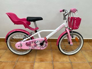 Bicicleta infantil rosa con asiento