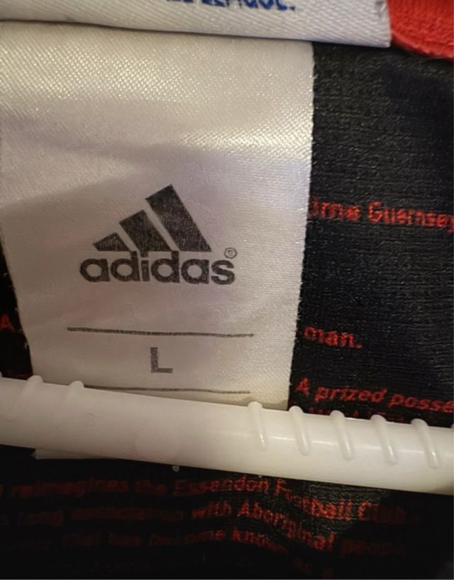 Camiseta AFL Essendon Bombers – Edição Indígena