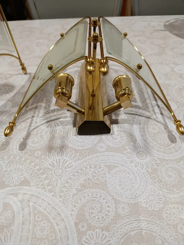 Apliques de pared dorados y transparentes