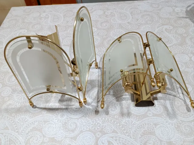 Apliques de pared dorados y transparentes