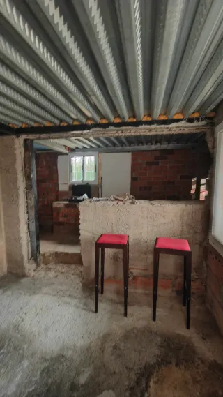 Terreno con construcción en alquiler