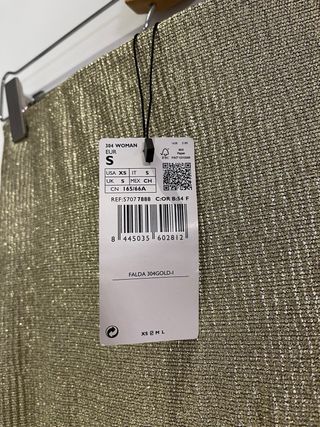 Falda midi dorada Mango con etiquetas