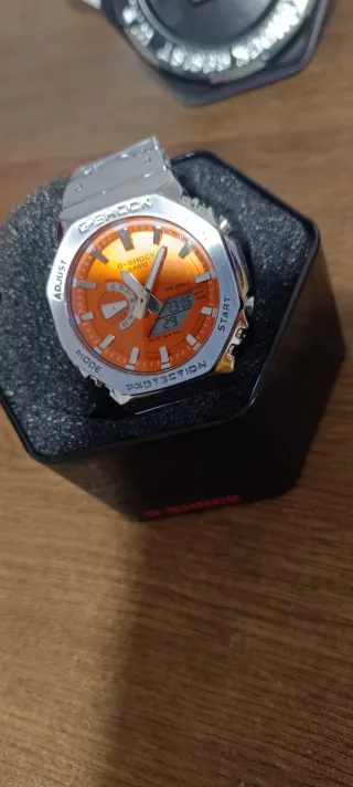 Reloj Casio como  G-Shock Naranja y Plateado