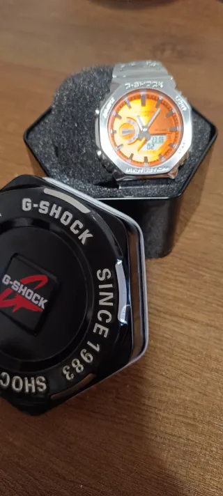 Reloj Casio como  G-Shock Naranja y Plateado