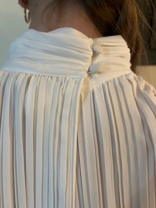 Blusa blanca plisada