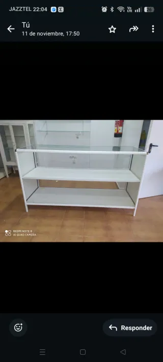 Mostrador expositor blanco y cristal