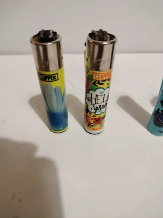 Pack 26 •  4 accendini Clipper con fantasie