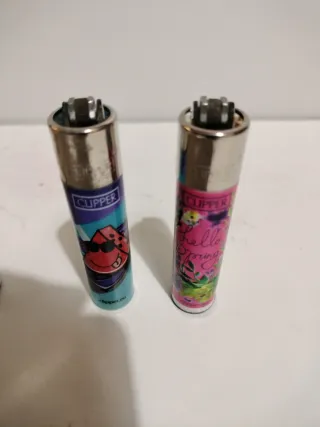 Pack 26 •  4 accendini Clipper con fantasie