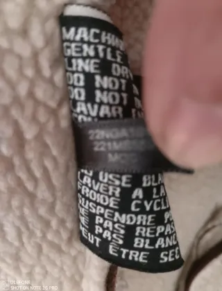 Chaqueta Guess con cuello de pelo