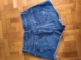 Shorts vaqueros desgastados mujer