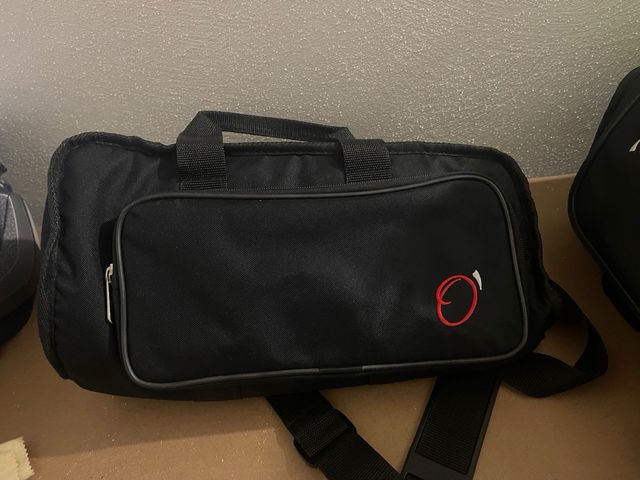 Funda para corneta, atril y aceite.