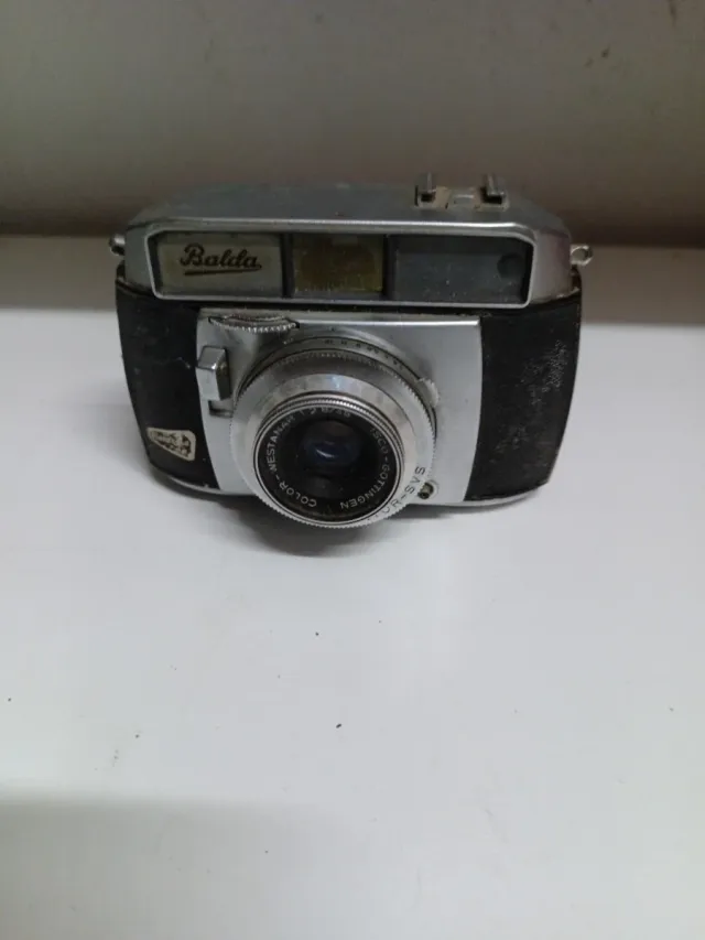 Cámara Balda Antigua Plata y Negro