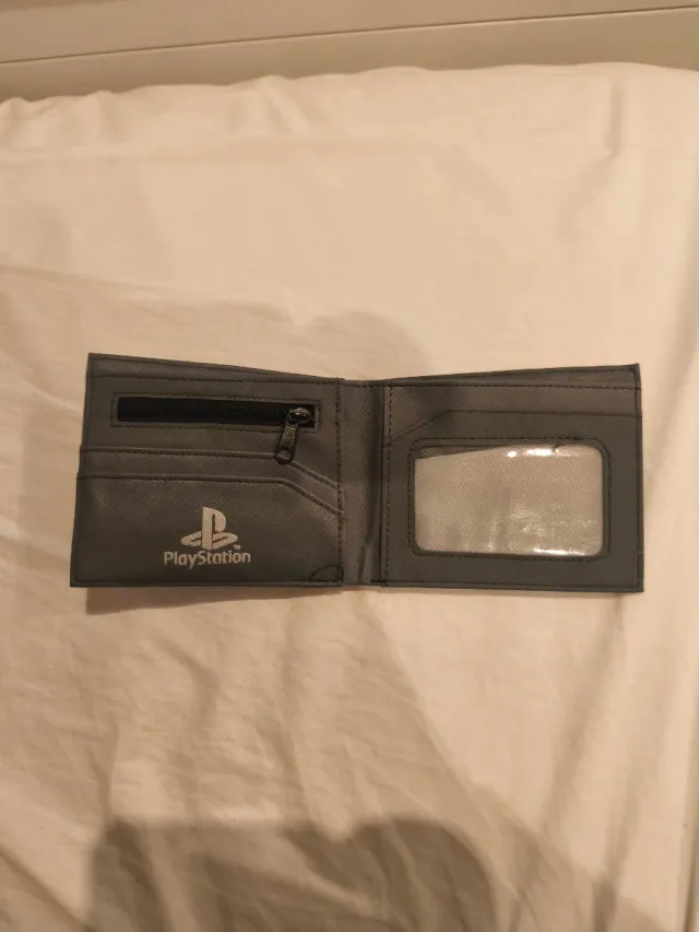 Cartera gris PlayStation