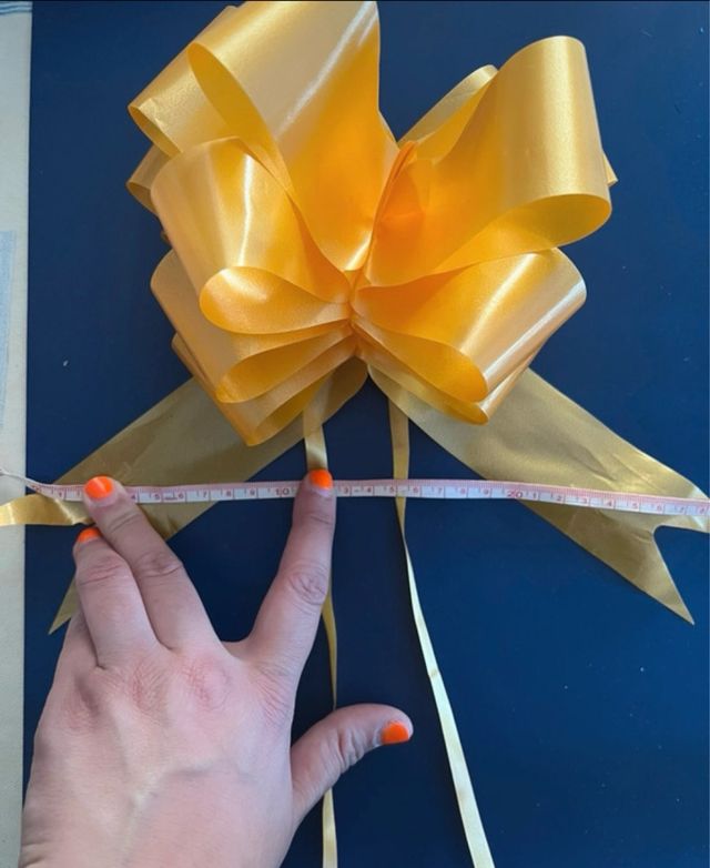 Lazos de regalo grandes dorados y azul cielo