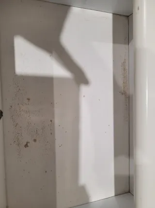 Mueble auxiliar blanco con puerta de cristal