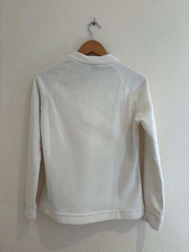 Forro polar blanco con cremallera