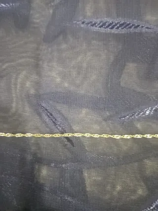 Cadena y cruz de plata con piedras