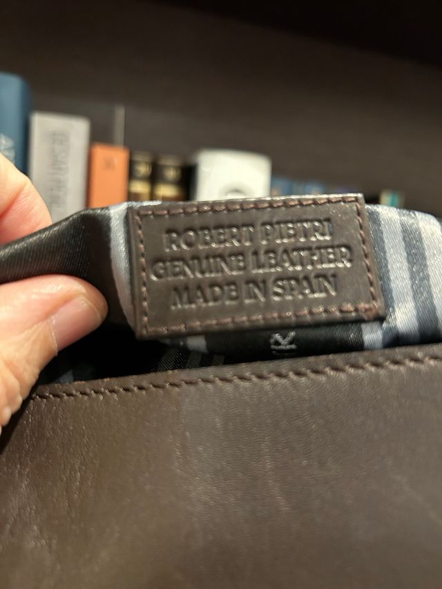 Bolso piel marrón y animal print