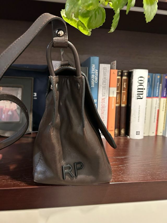 Bolso piel marrón y animal print