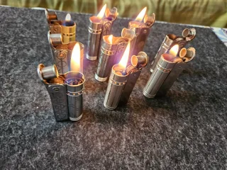 Set di 9 accendini vintage