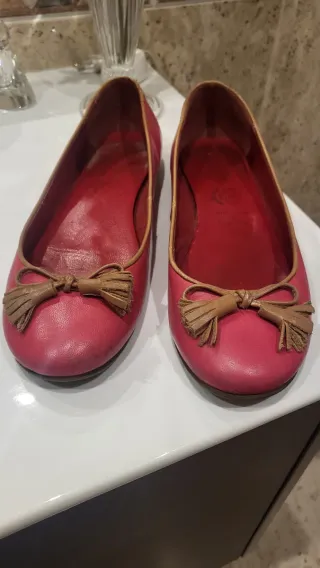 Manoletinas de piel rosas con detalle de lazo