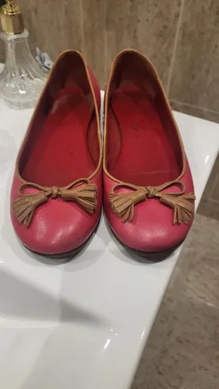 Manoletinas de piel rosas con detalle de lazo