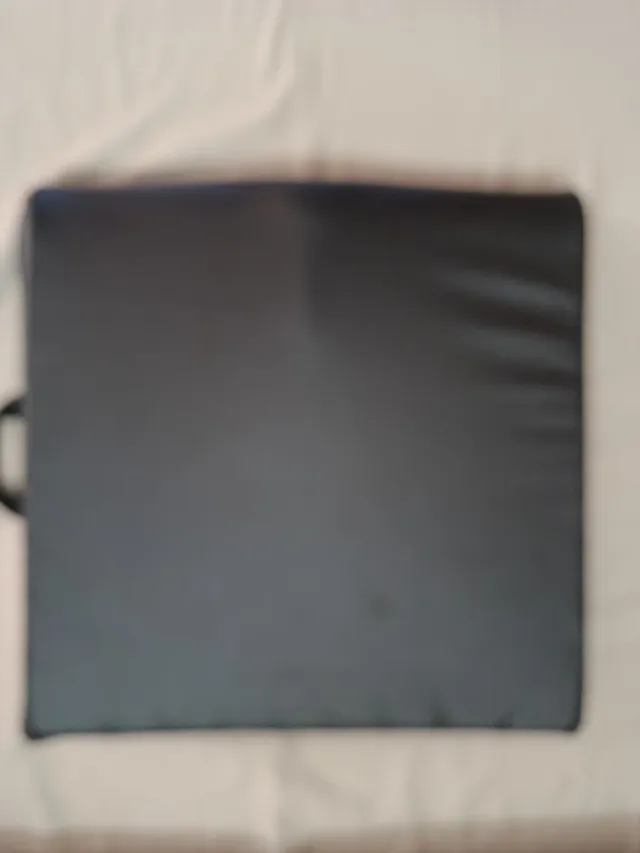 Cojín para silla de ruedas gris