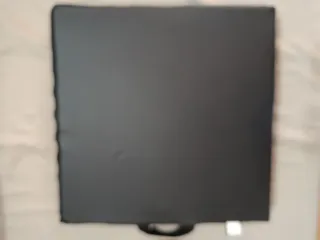 Cuscino per sedia a rotelle grigio