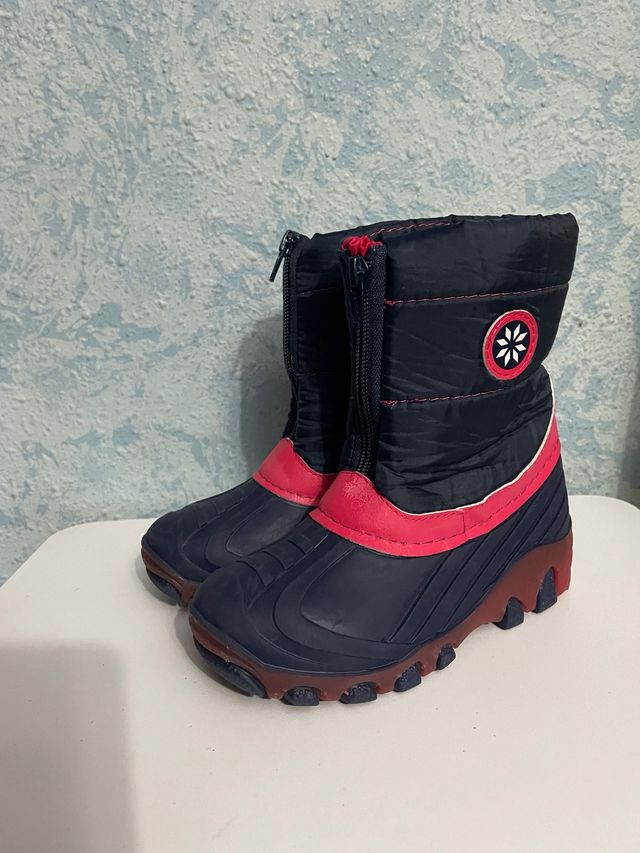 Botas de nieve niña azul y fuscia
