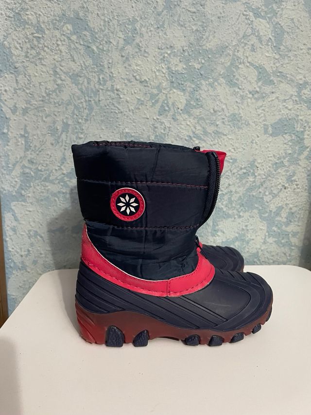 Botas de nieve niña azul y fuscia