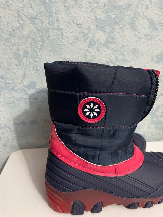 Botas de nieve niña azul y fuscia