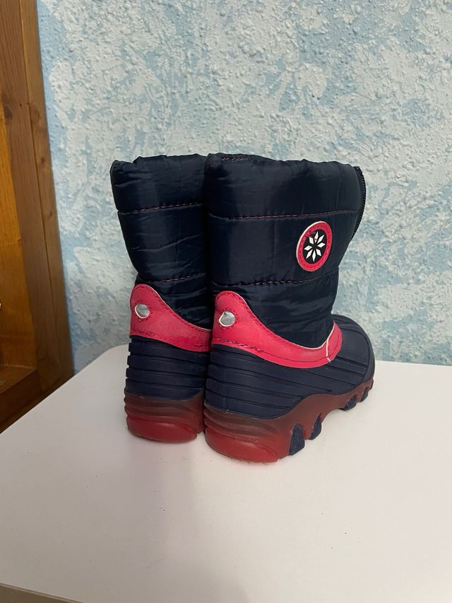 Botas de nieve niña azul y fuscia