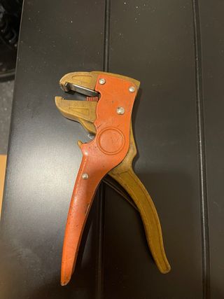 Pelacables manual naranja y dorado