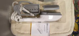 Plancha de vapor SteamBuddy para ropa