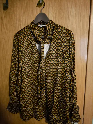 Blusa estilo vintage estampado geométrico