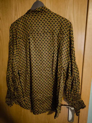 Blusa estilo vintage estampado geométrico