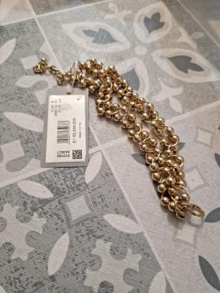 Pulsera de bolas doradas